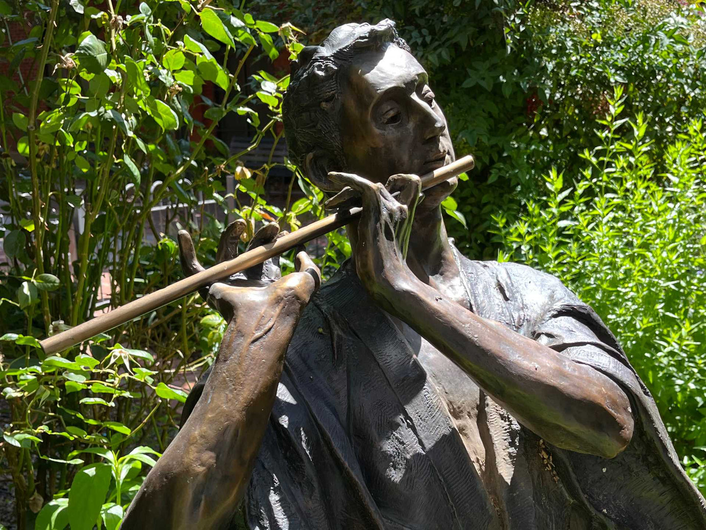 Detail of bronze statue of Tamino in Bisbee's Grassy Park