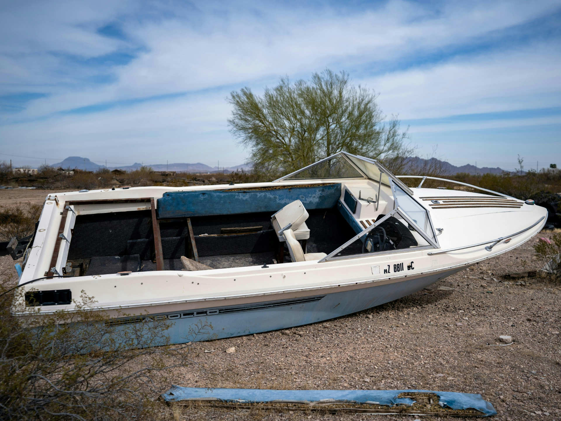 Abandoned boat in a desert landscape