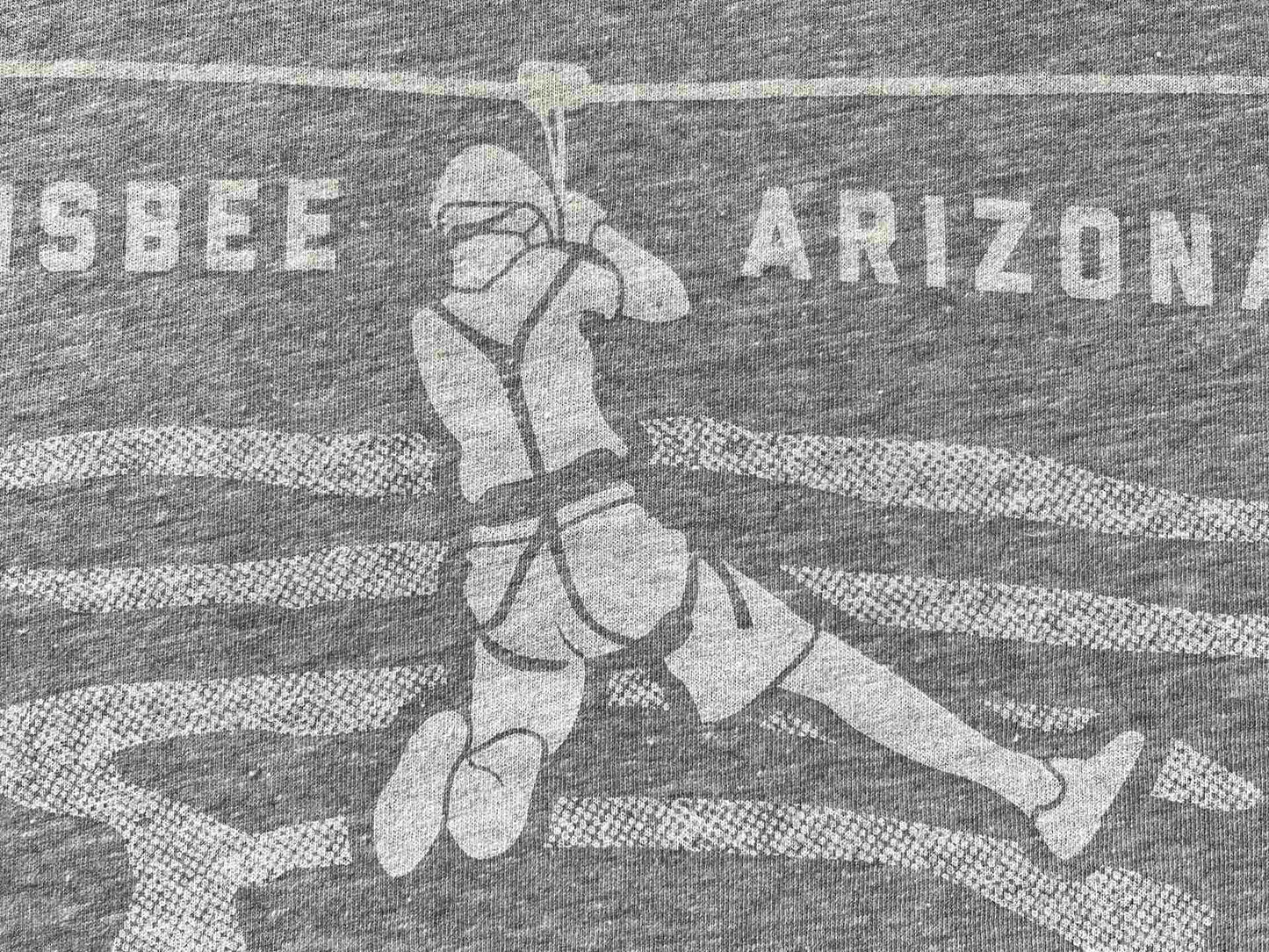 Detail of a design showing a person zip-lining over the Lavender Pit in Bisbee, Arizona